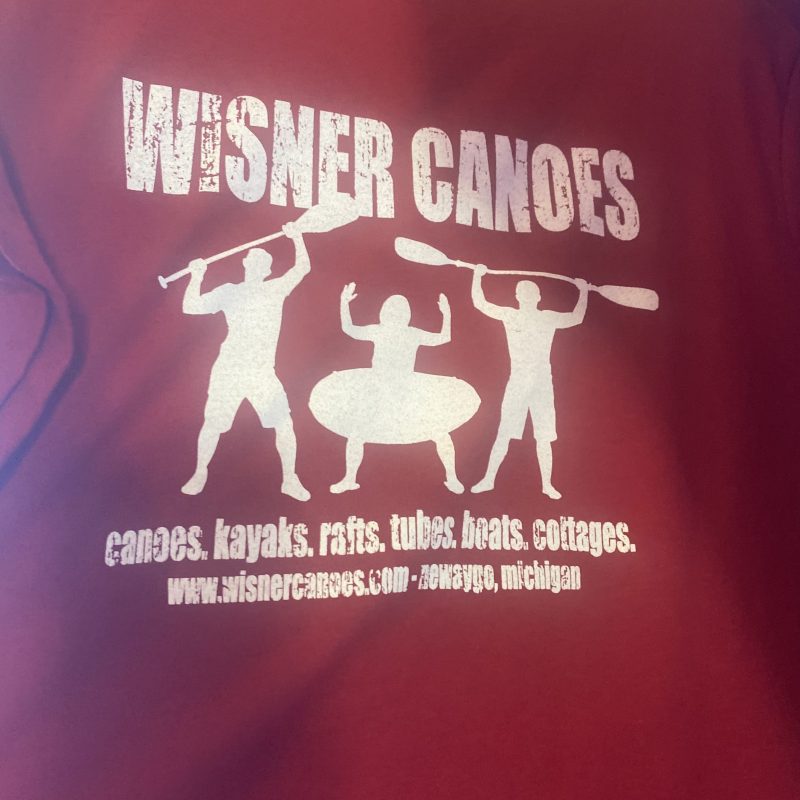 Red t-shirt with 'Wisner Canoes' and silhouettes of people holding paddles and a canoe.